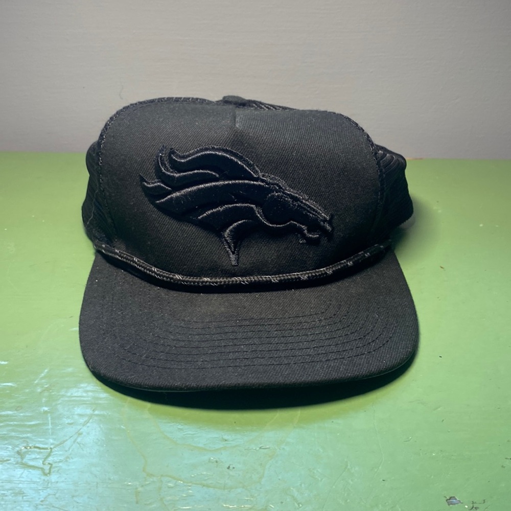 Blackout Denver Broncos NFL hat.